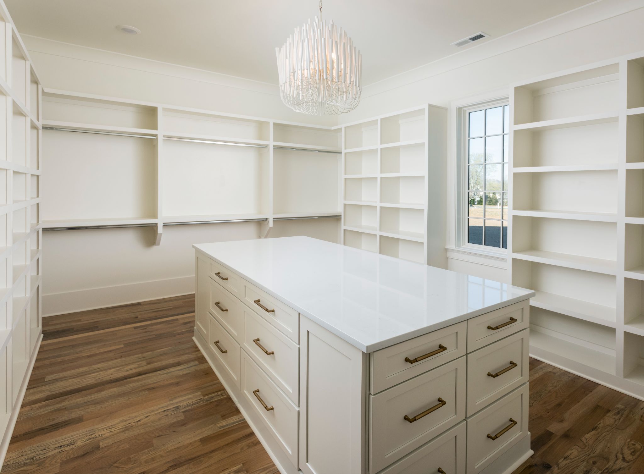 Custom Walk-In Closet by Barlow Builders